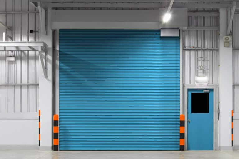 Roller door or roller shutter. Also called security door