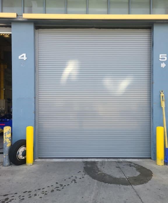 bollard posts on either side of a rolling door