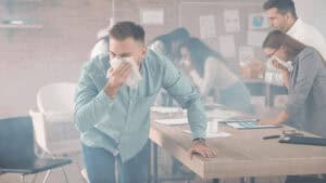 people covering their mouths because of smoke