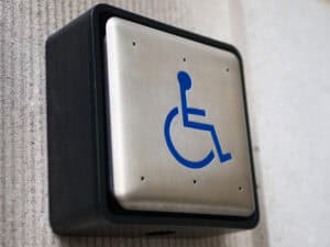 Push to open button for disabled