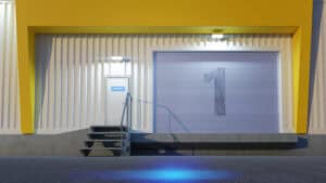 A private warehouse building with a roll-up garage door.